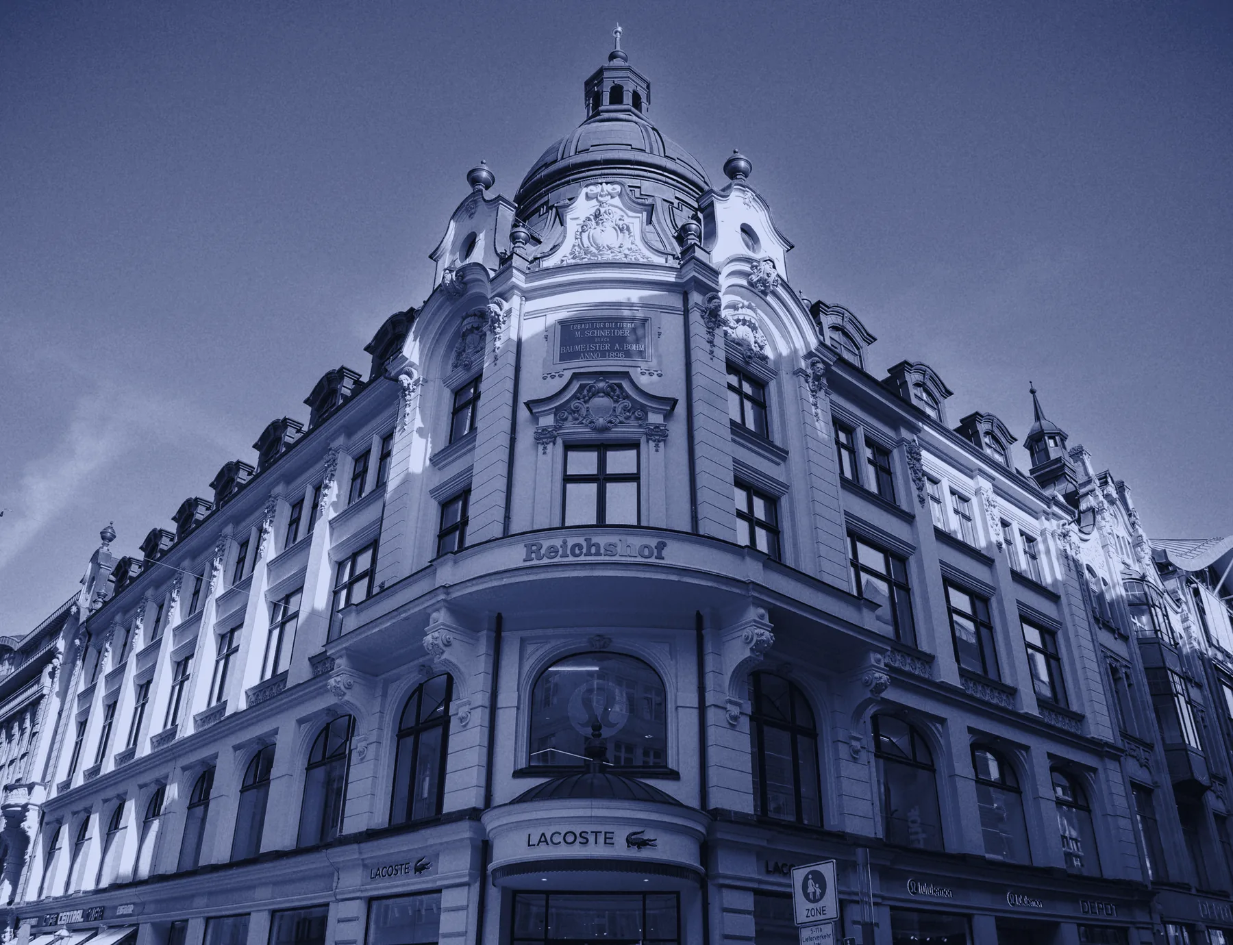 An ornate building on a German street corner