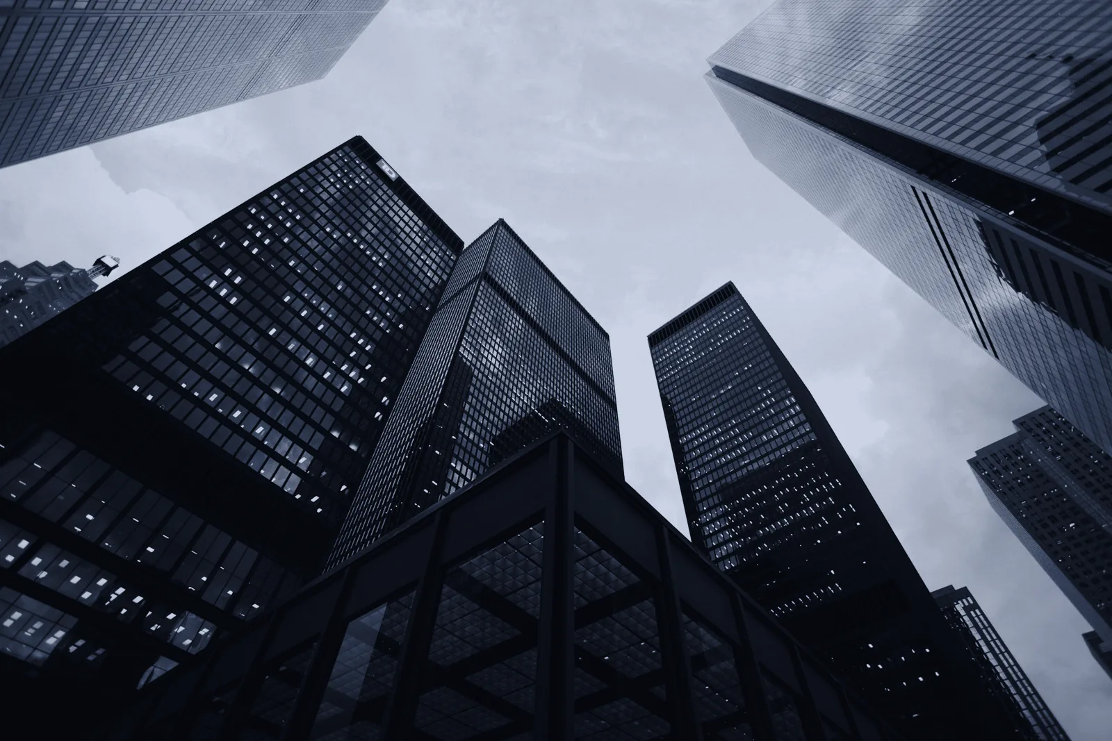 Glass office towers seen from street level